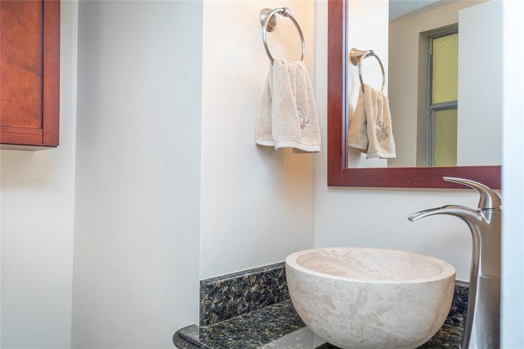 5300 Northeast 24th Terrace, Unit 416C Fort Lauderdale, FL 33308 - Photo 9 of 26 a bathroom with a sink and a mirror