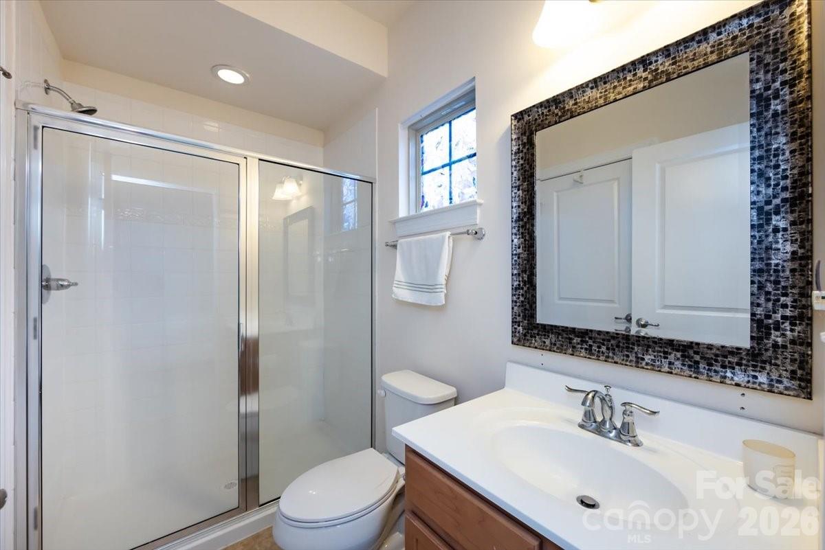 7335 Millstone Circle Southwest Concord, NC 28025 - Photo 20 of 40 a bathroom with a sink toilet and shower