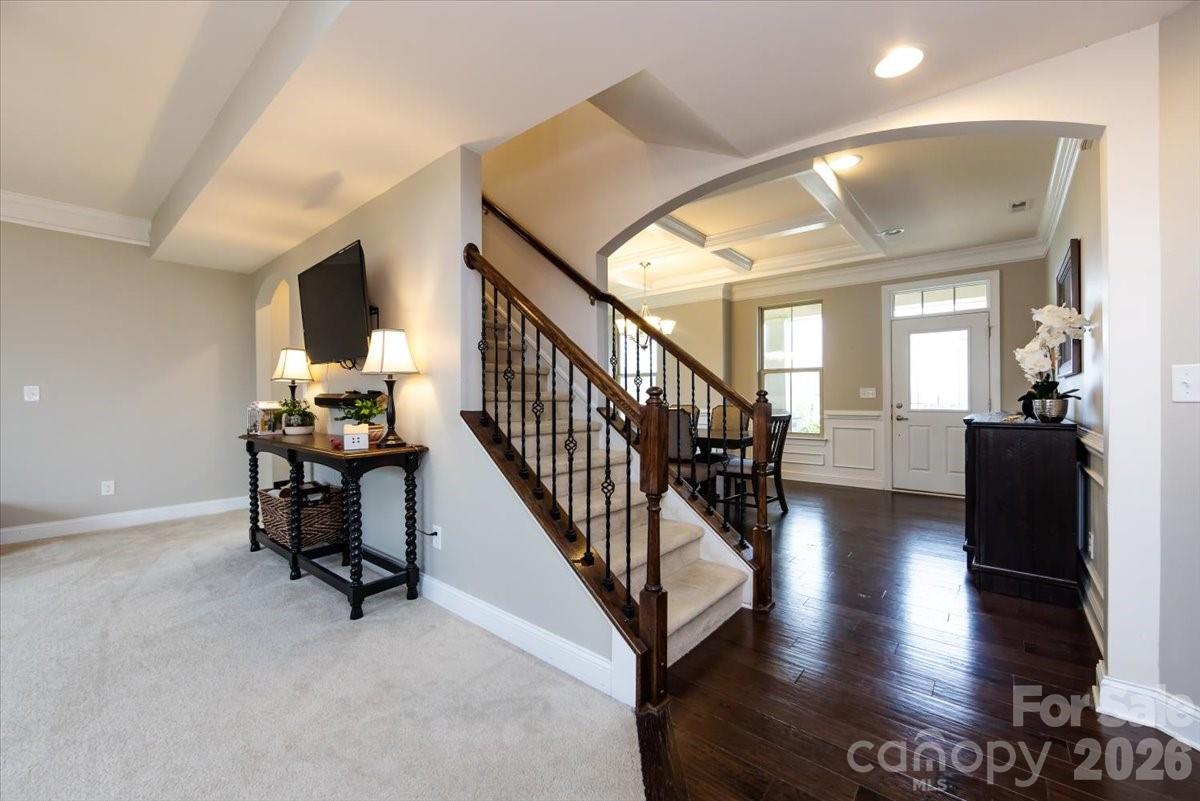 7335 Millstone Circle Southwest Concord, NC 28025 - Photo 22 of 40 a view of a livingroom with furniture and hardwood floor