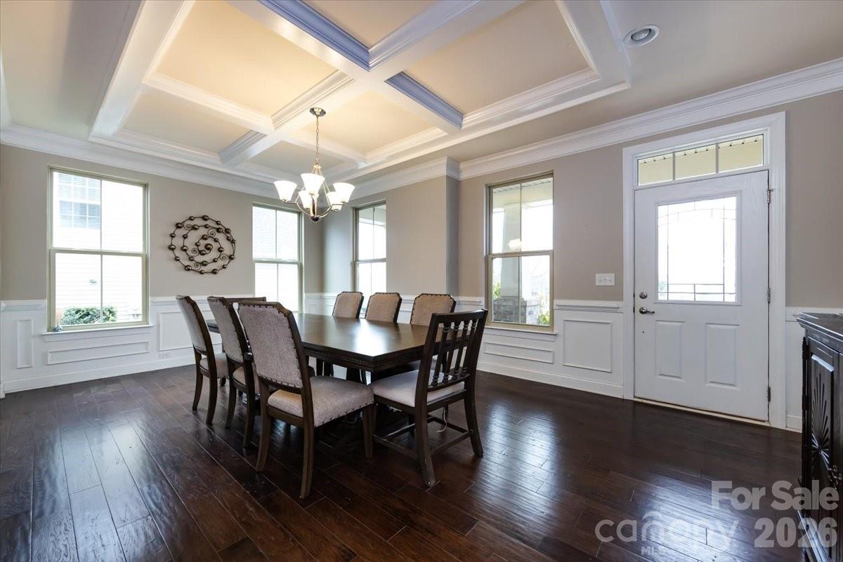 7335 Millstone Circle Southwest Concord, NC 28025 - Photo 4 of 40 a view of a dining room with furniture window and wooden floor