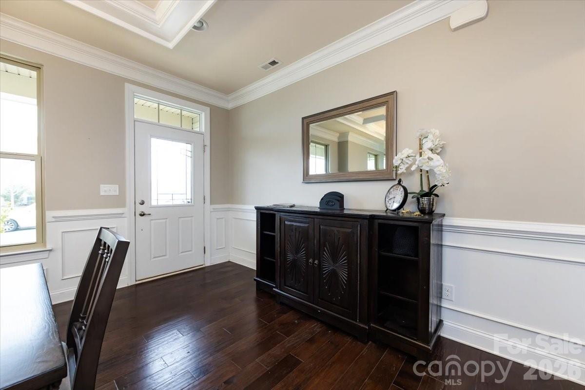 7335 Millstone Circle Southwest Concord, NC 28025 - Photo 7 of 40 a view of a workspace with furniture and a window