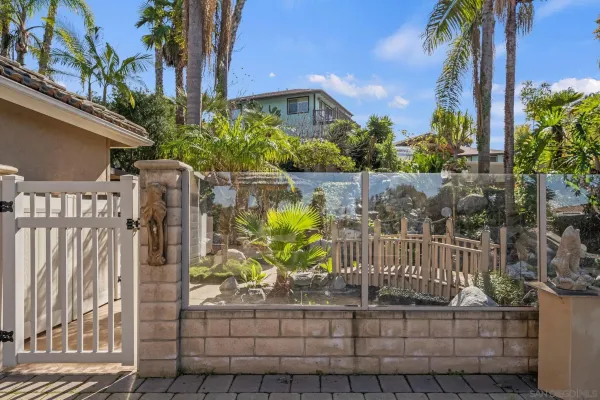 a bath tub sitting in a bathroom next to a window
