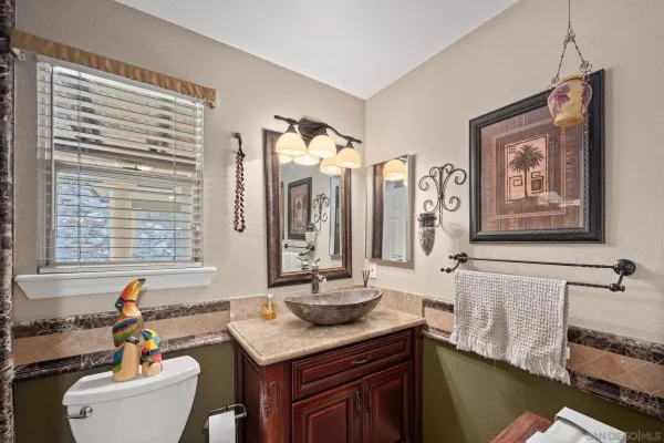 a bathroom with double vanity sinks double vanity and a mirror