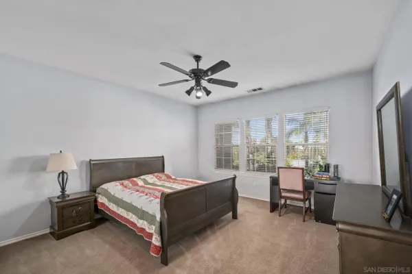 a view of a palm trees in front of a house