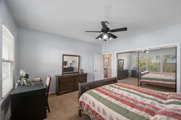 a view of a fountain in front of the house