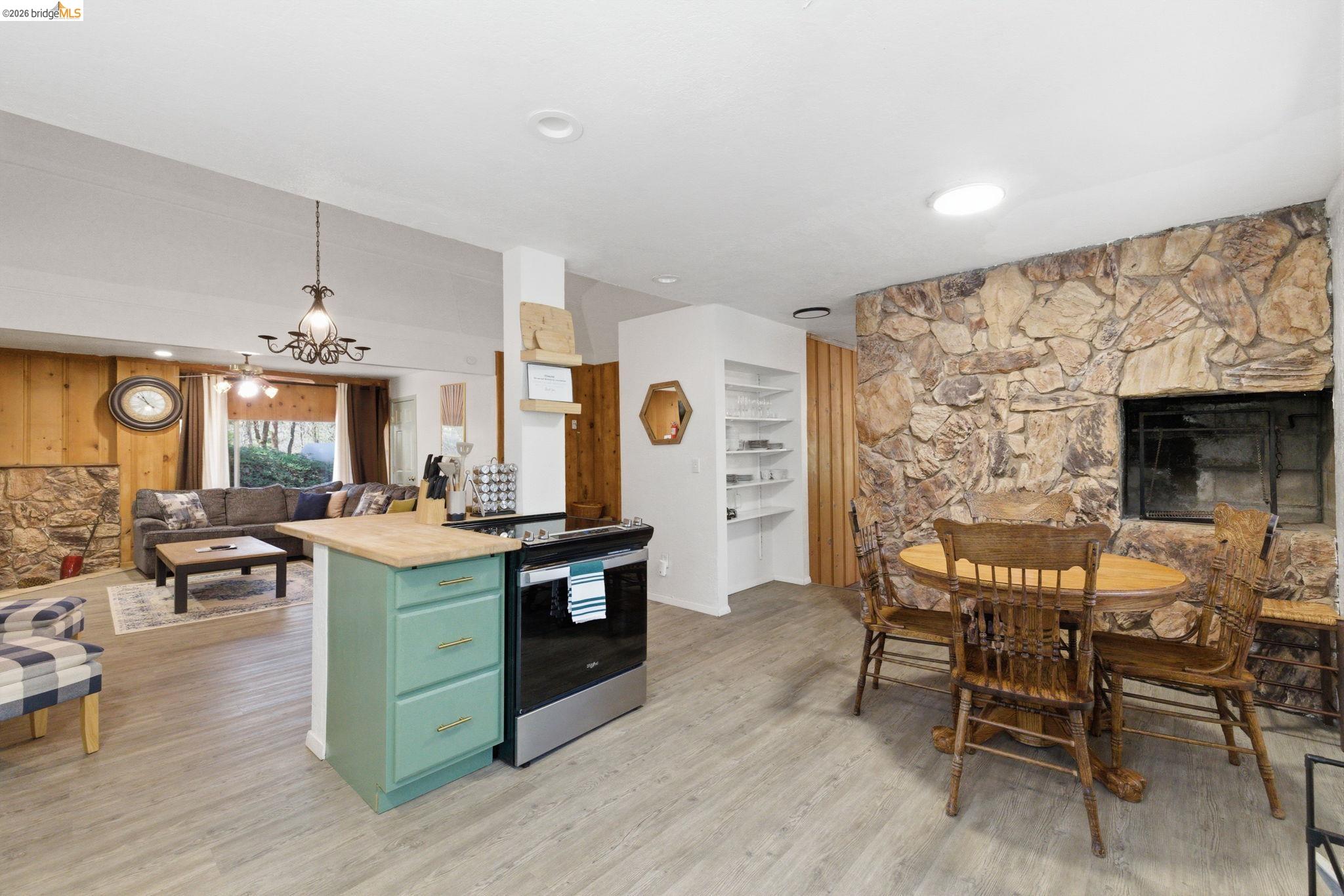 24189 South Fork Road Twain Harte, CA 95383 - Photo 34 of 34 a view of a dining room with furniture and wooden floor