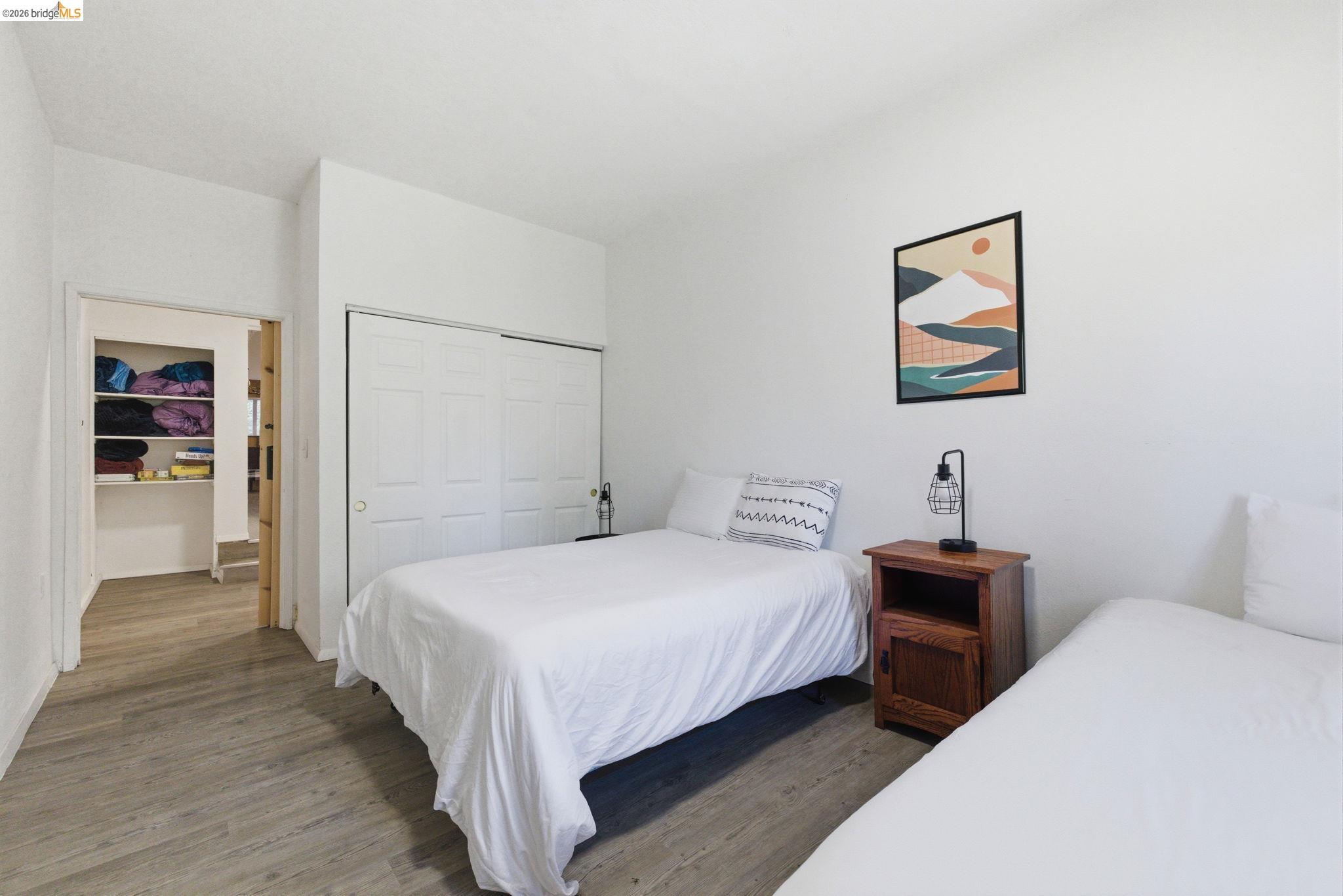 24189 South Fork Road Twain Harte, CA 95383 - Photo 21 of 34 a bedroom with a bed and a table