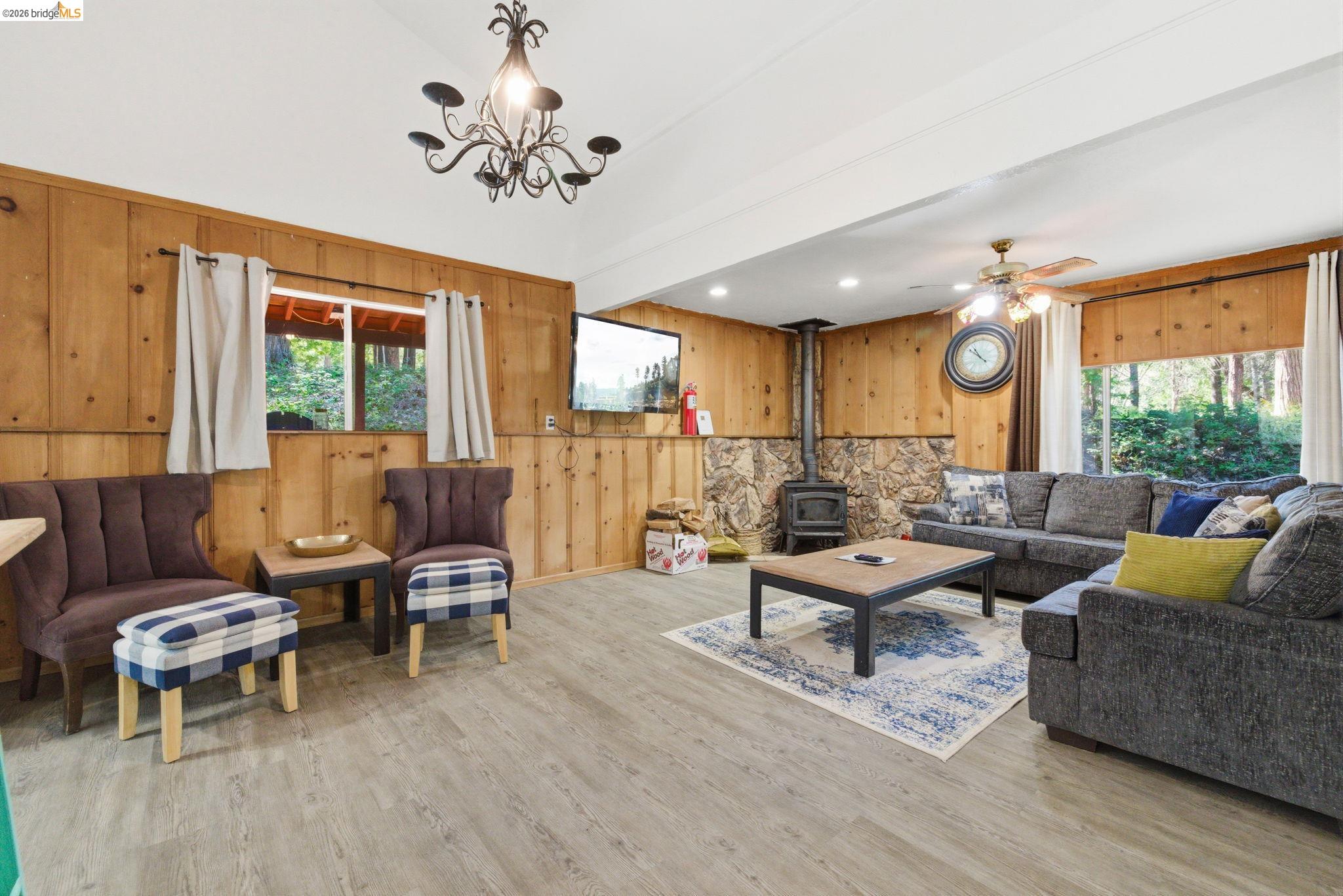 24189 South Fork Road Twain Harte, CA 95383 - Photo 2 of 34 a living room with furniture and a large window