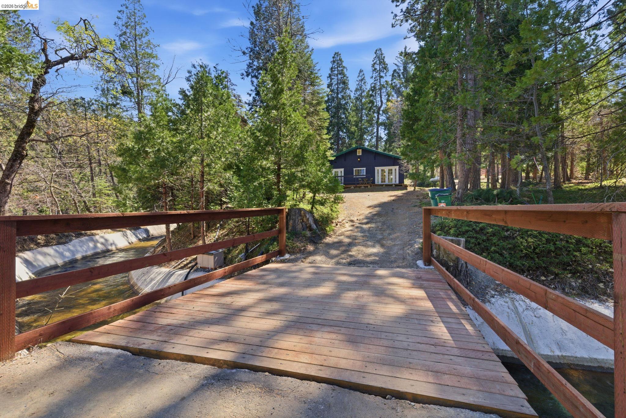 24189 South Fork Road Twain Harte, CA 95383 - Photo 31 of 34 a view of a yard with large trees