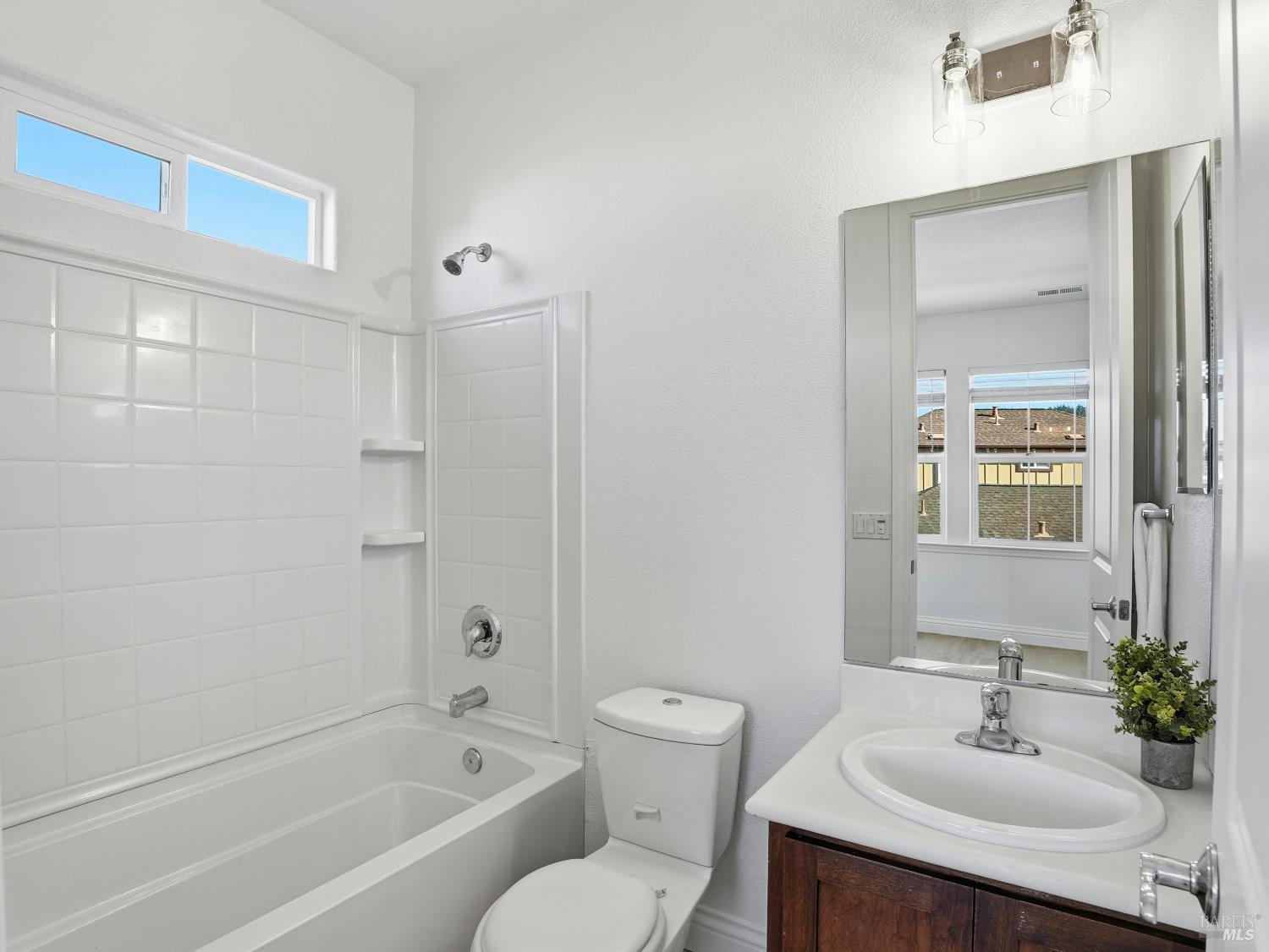 4424 Streamside Drive Santa Rosa, CA 95409 - Photo 43 of 55 a bathroom with a sink toilet and shower