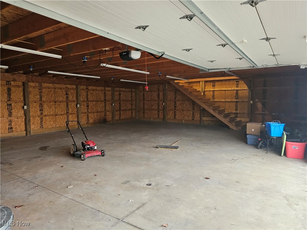 2415 Columbiana Road New Springfield, OH 44443 - Photo 7 of 25 Garage number 2 featuring a garage door opener