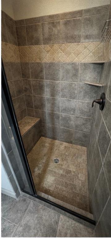 121 Rey Del Mar Circle Weatherford, TX 76085 - Photo 19 of 29 a bathroom with a shower
