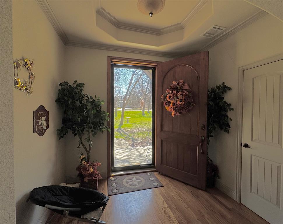 121 Rey Del Mar Circle Weatherford, TX 76085 - Photo 7 of 29 a living room with furniture and a window