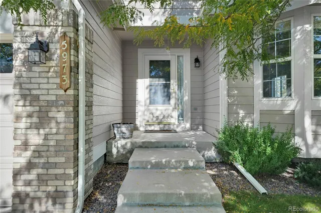 a view of a entrance door of the house
