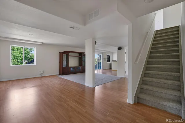 a bathroom with a sink a toilet and vanity