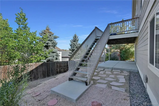 a aerial view of a house with a yard