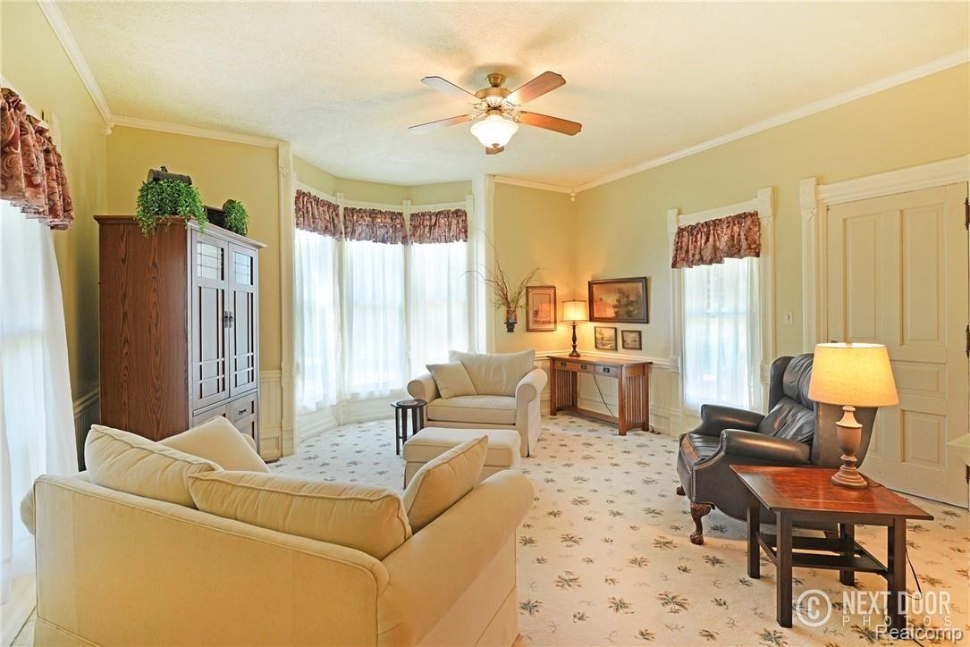 3792 Byron Road Howell, MI 48855 - Photo 16 of 38 Lots of natural light in this spacious living room with original built in cabinets