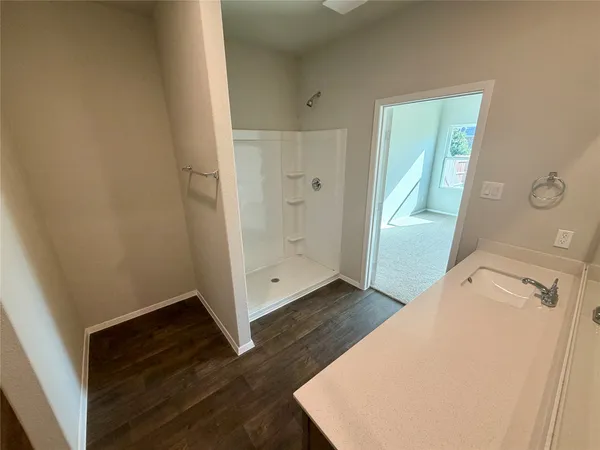 an entryway with wooden floor