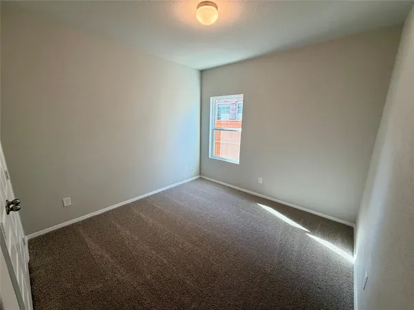 a view of empty room with window