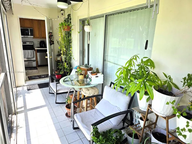 a outdoor dining space with furniture