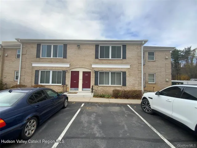 a car parked in front of a house
