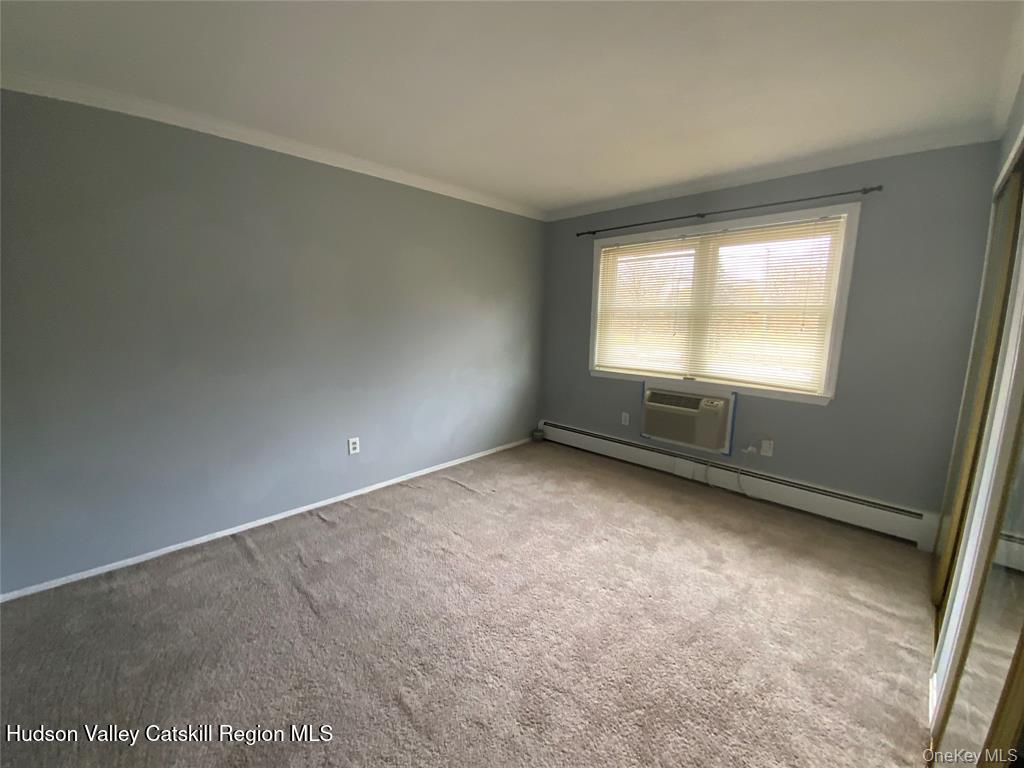 250 Beechwood Avenue Poughkeepsie, NY 12601 - Photo 5 of 7 an empty room with a window