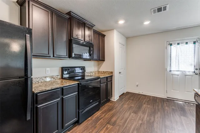 a bathroom with a sink and a window
