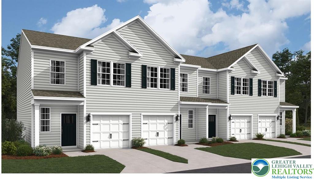 1157 Martin Road Breinigsville, PA 18031 - Photo 1 of 25 a front view of a house with a yard