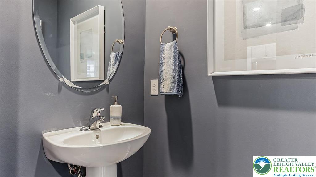 1157 Martin Road Breinigsville, PA 18031 - Photo 13 of 25 a bathroom with a sink and a mirror
