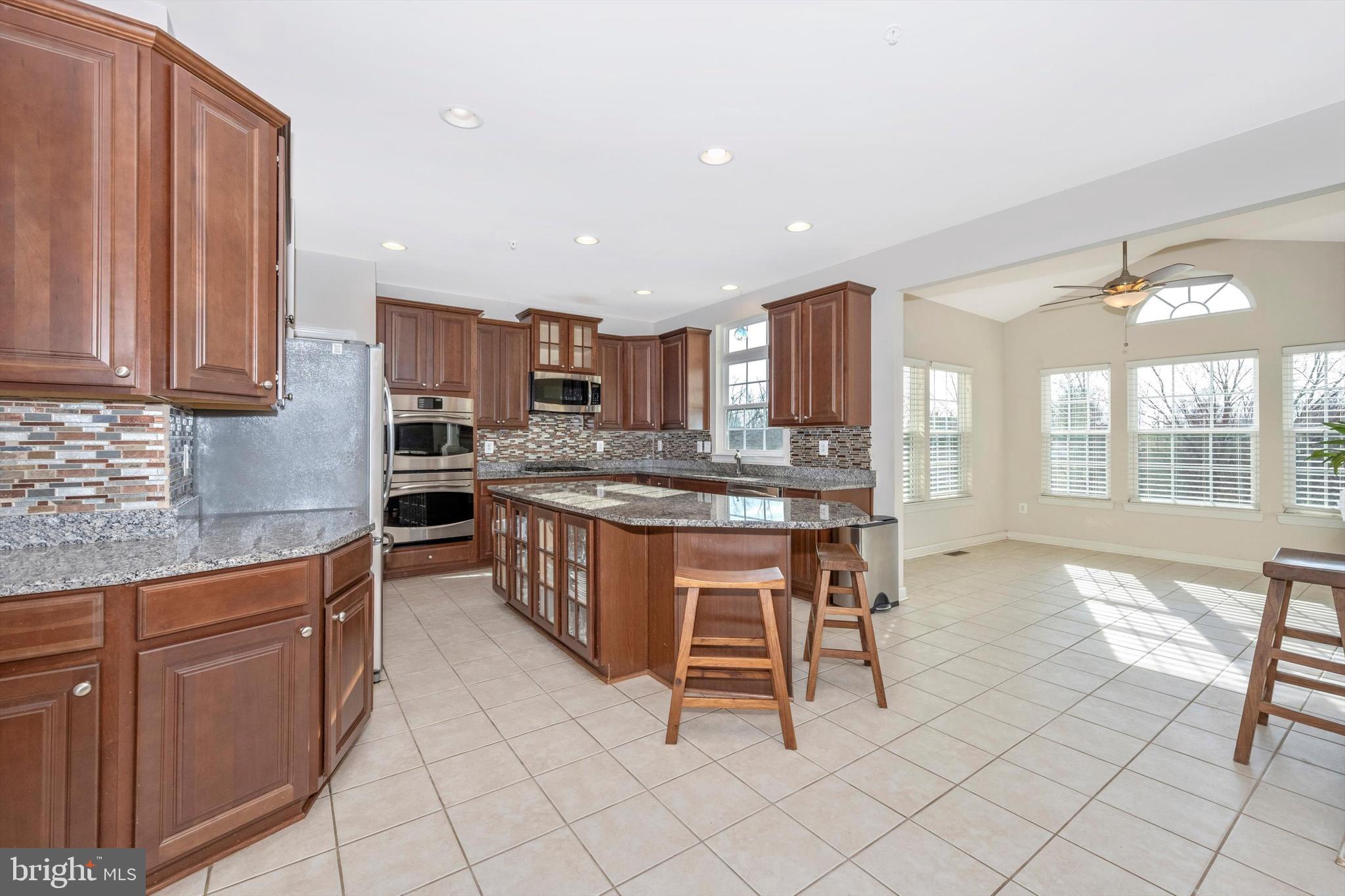 9121 Bealls Farm Road Frederick, MD 21704 - Photo 10 of 63 a kitchen with a sink cabinets and window