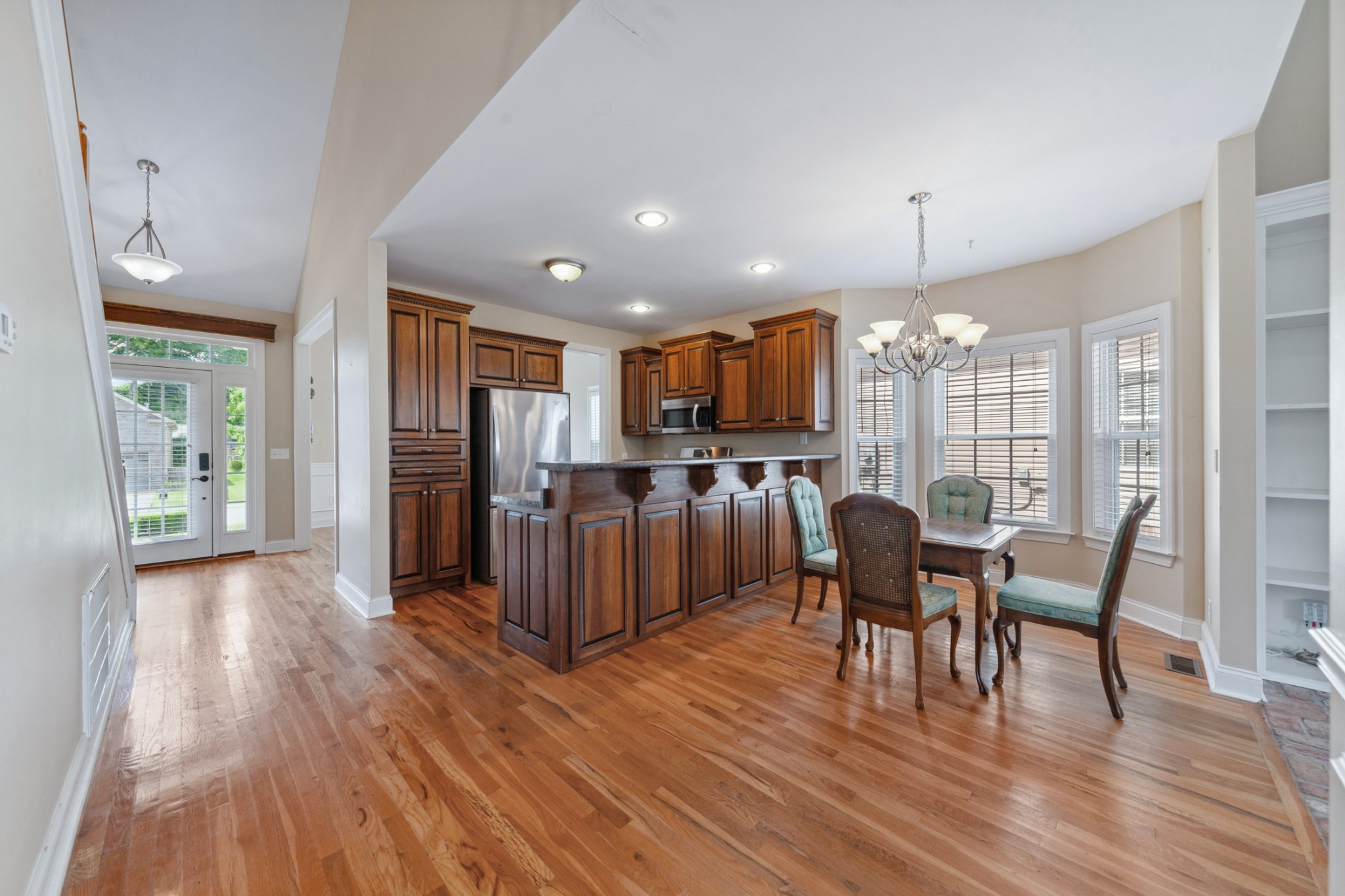 1093 Golf View Way Spring Hill, TN 37174 - Photo 13 of 46 a view of kitchen with cabinets and wooden floor