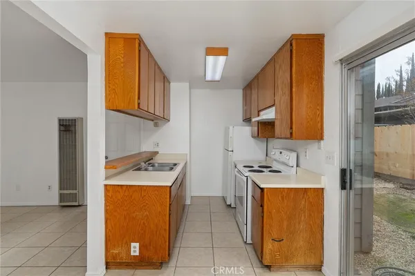a view of an empty room with a glass door