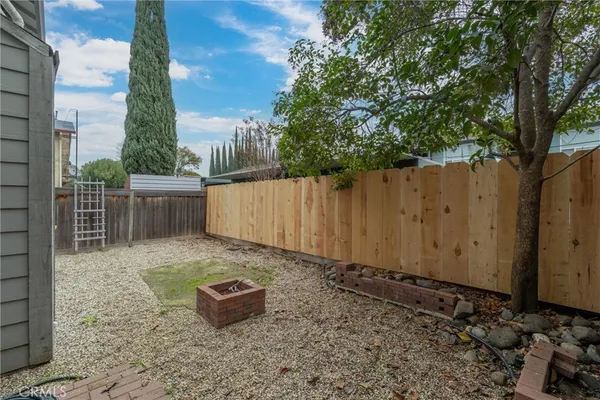 a backyard of a house with lots of green space