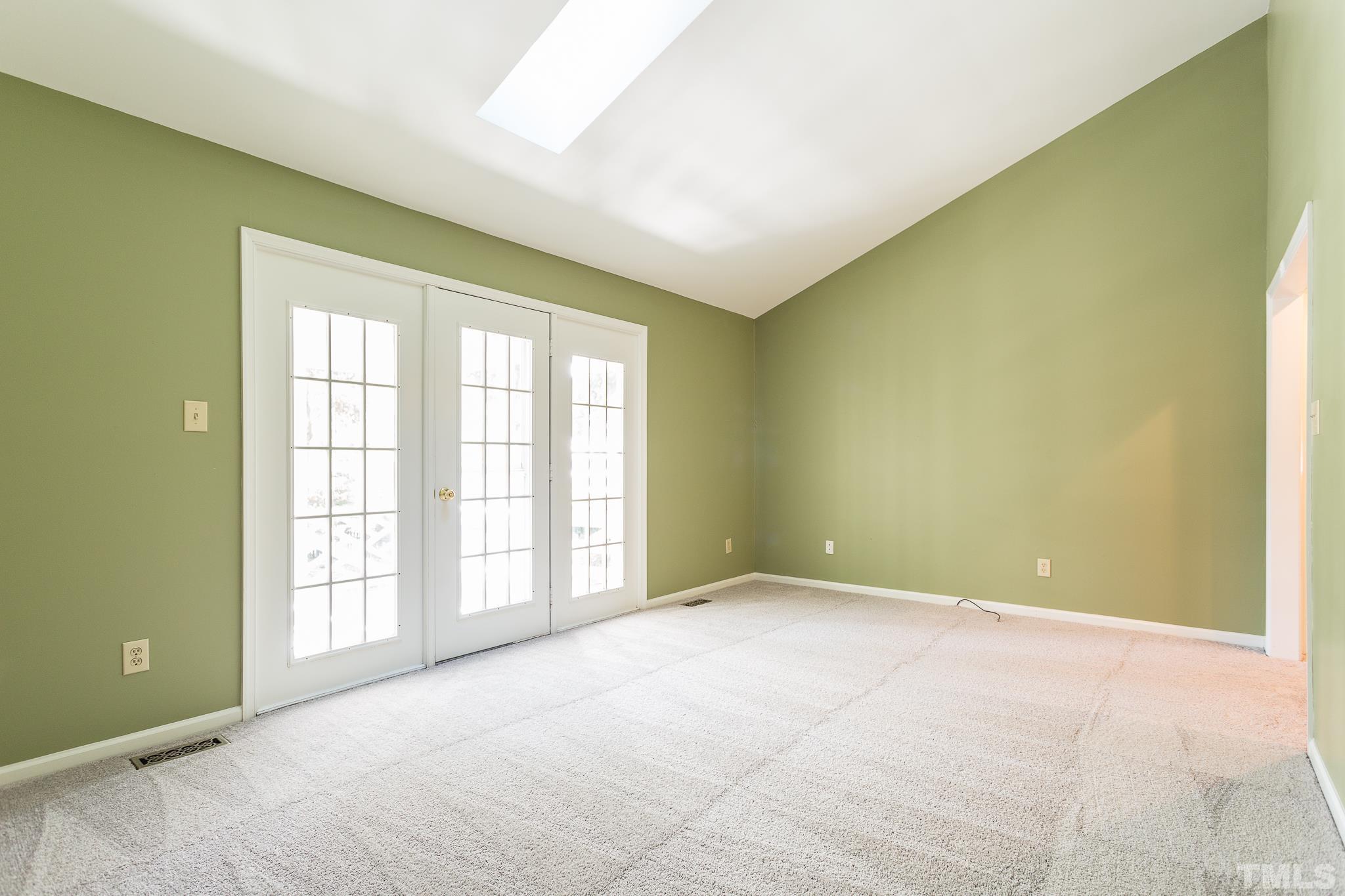 1200 Oakside Court Raleigh, NC 27609 - Photo 11 of 28 an empty room with windows