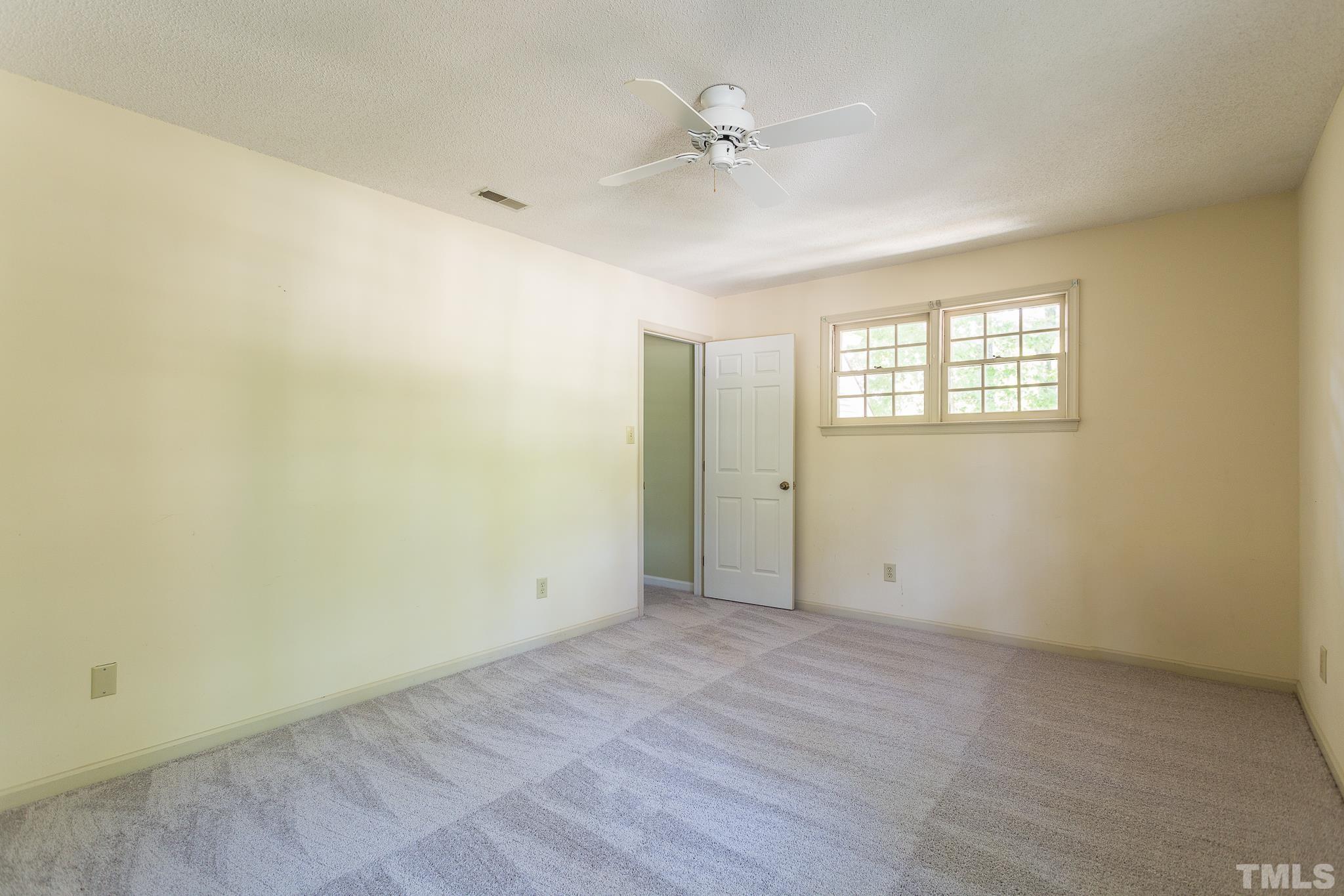 1200 Oakside Court Raleigh, NC 27609 - Photo 16 of 28 a view of an empty room with a window