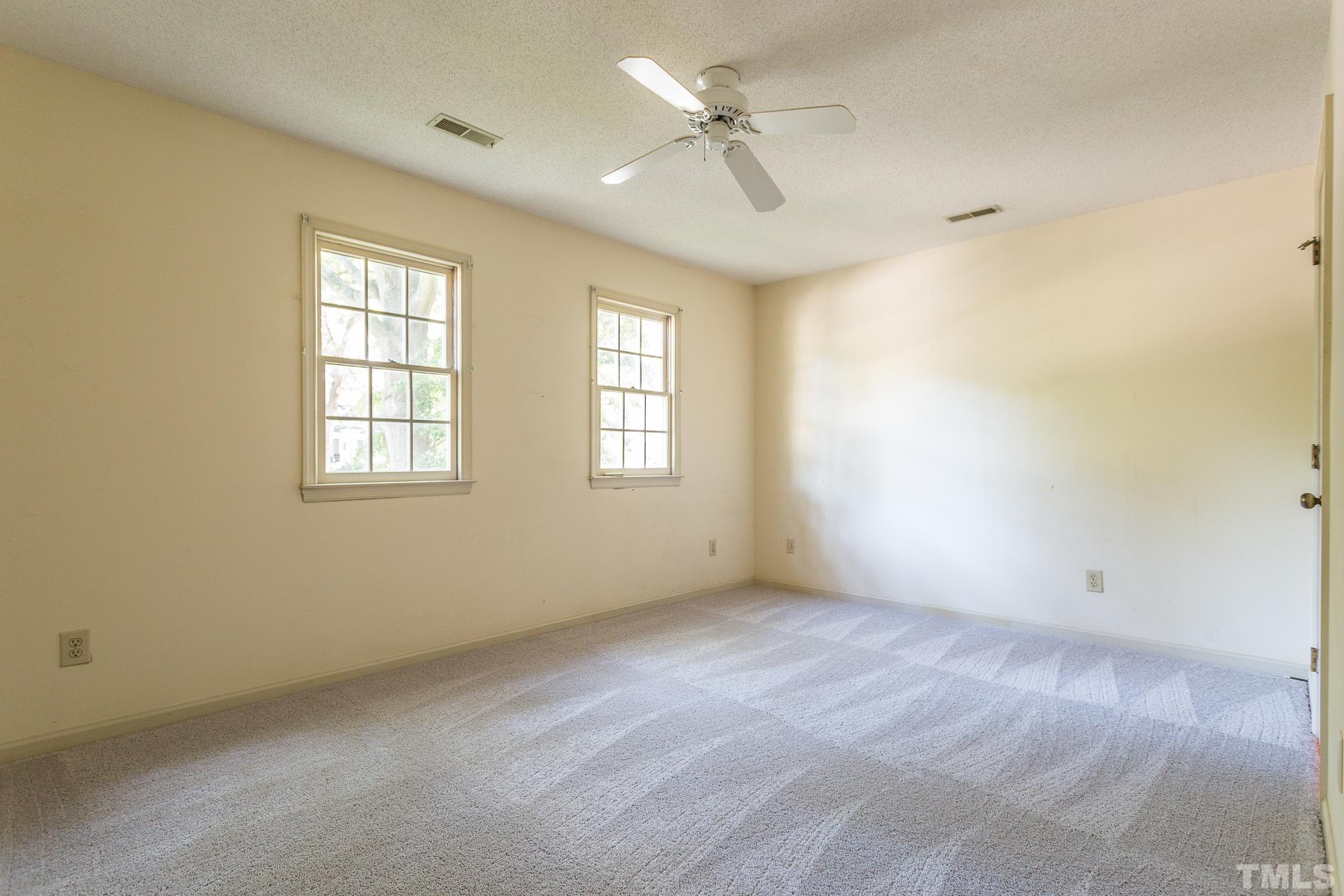 1200 Oakside Court Raleigh, NC 27609 - Photo 21 of 28 a view of an empty room with a window