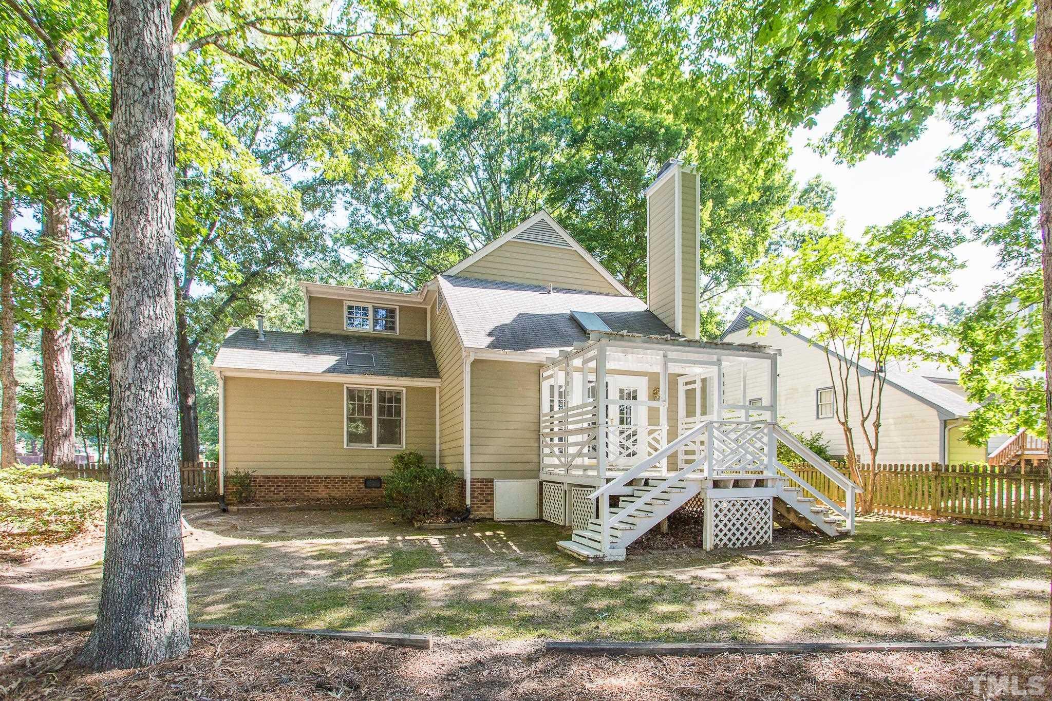 1200 Oakside Court Raleigh, NC 27609 - Photo 23 of 28 a view of a house with a yard