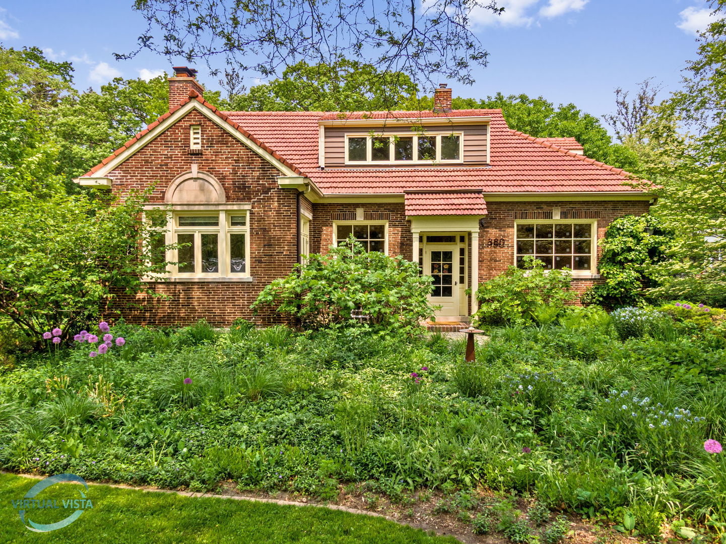 380 Fairbank Road Riverside, IL 60546 - Photo 1 of 30 a front view of a house with a yard
