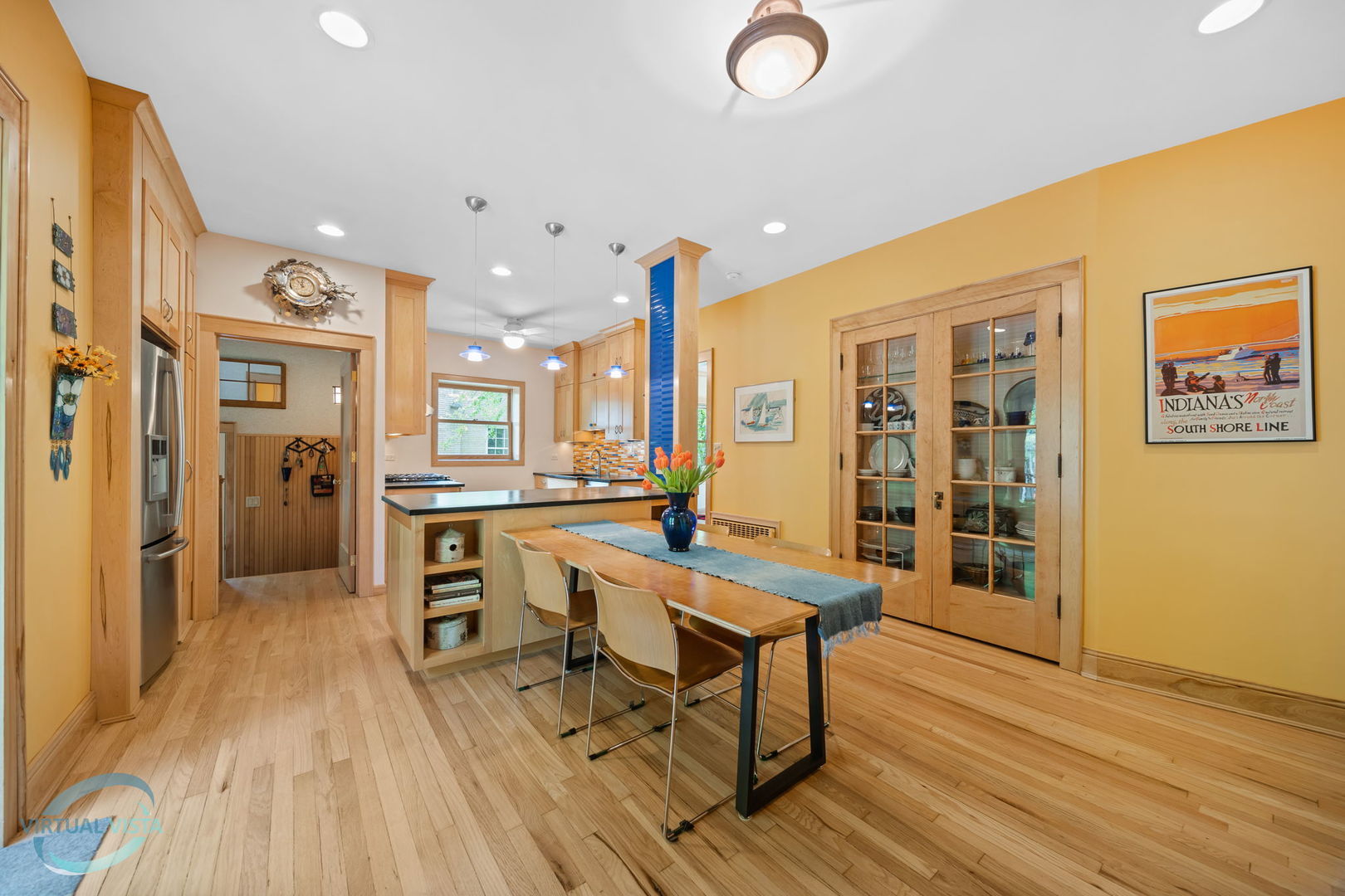 380 Fairbank Road Riverside, IL 60546 - Photo 11 of 30 a dining hall with stainless steel appliances refrigerator dining table and chairs