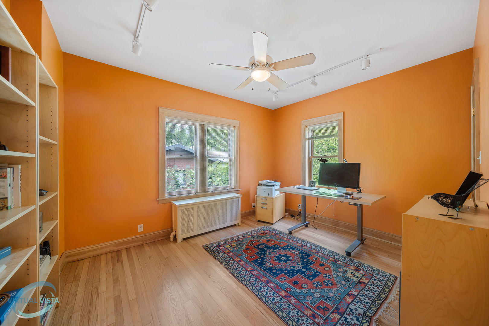 380 Fairbank Road Riverside, IL 60546 - Photo 16 of 30 a living room with furniture and a flat screen tv