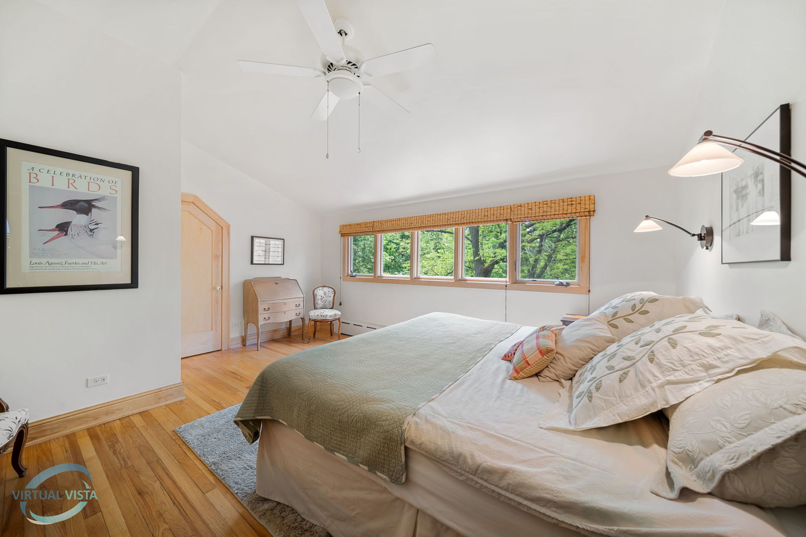 380 Fairbank Road Riverside, IL 60546 - Photo 20 of 30 a bedroom with a large bed and a chandelier