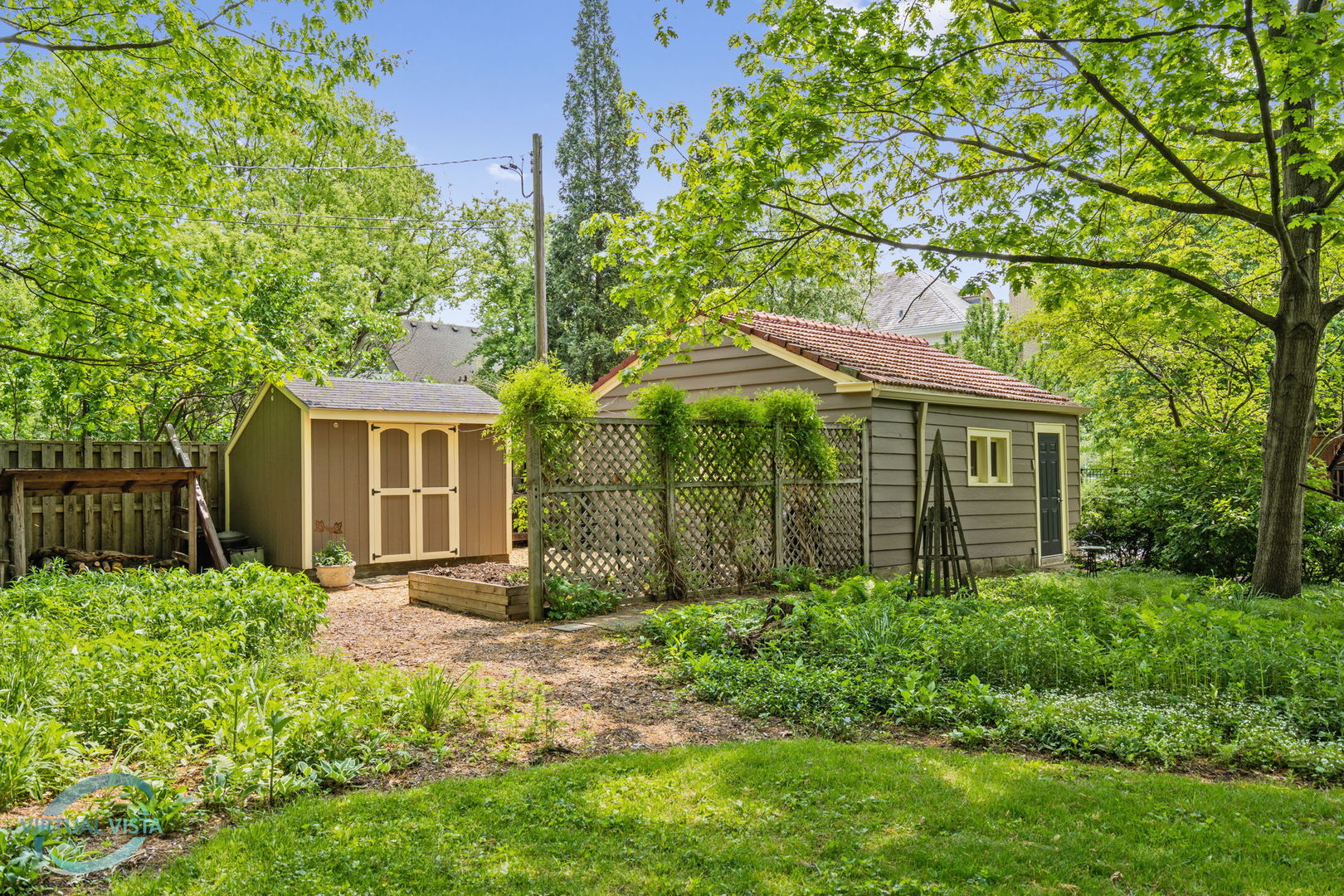 380 Fairbank Road Riverside, IL 60546 - Photo 24 of 30 a front view of a house with garden
