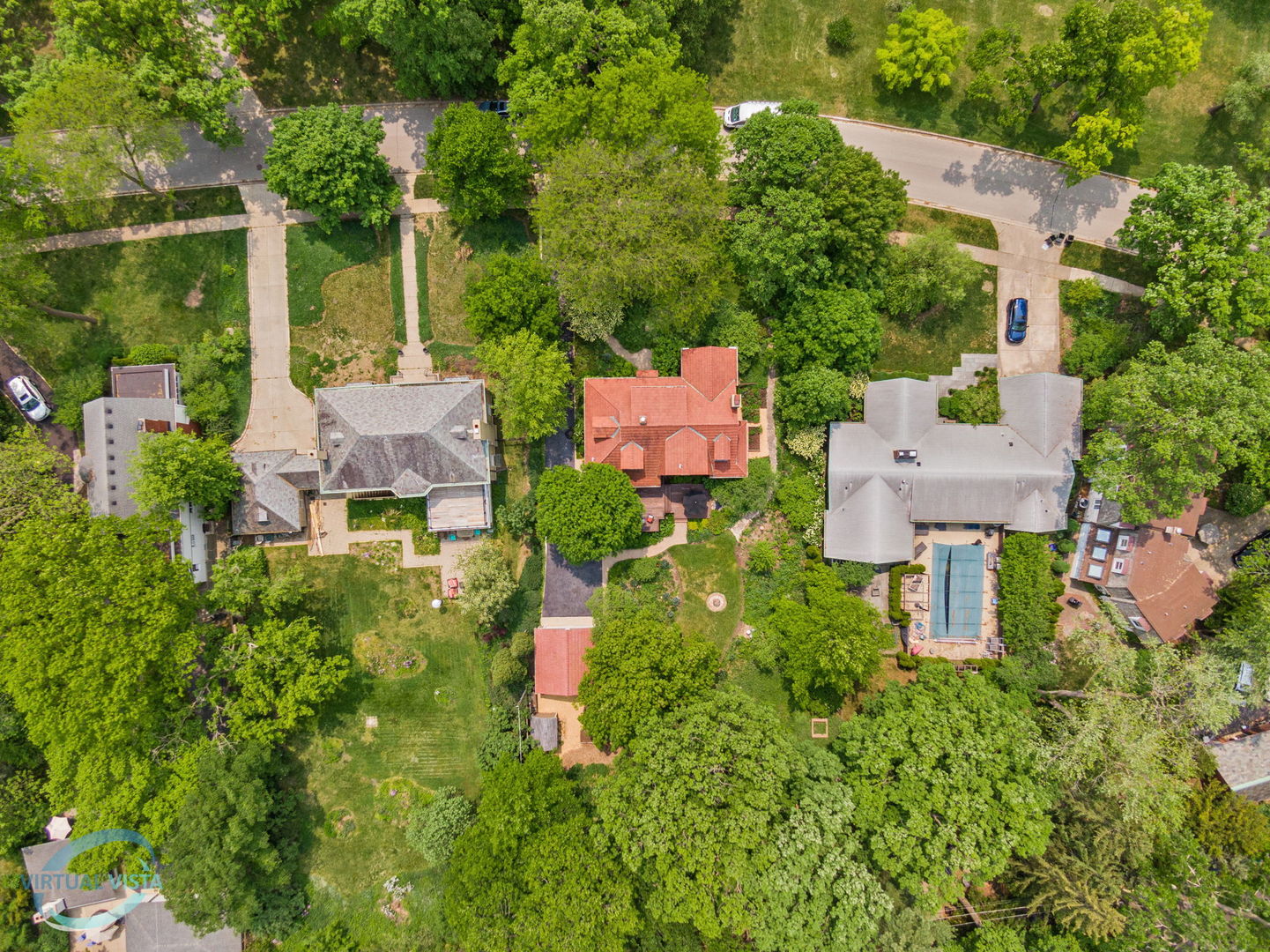 380 Fairbank Road Riverside, IL 60546 - Photo 28 of 30 an aerial view of a house with a yard and lake view