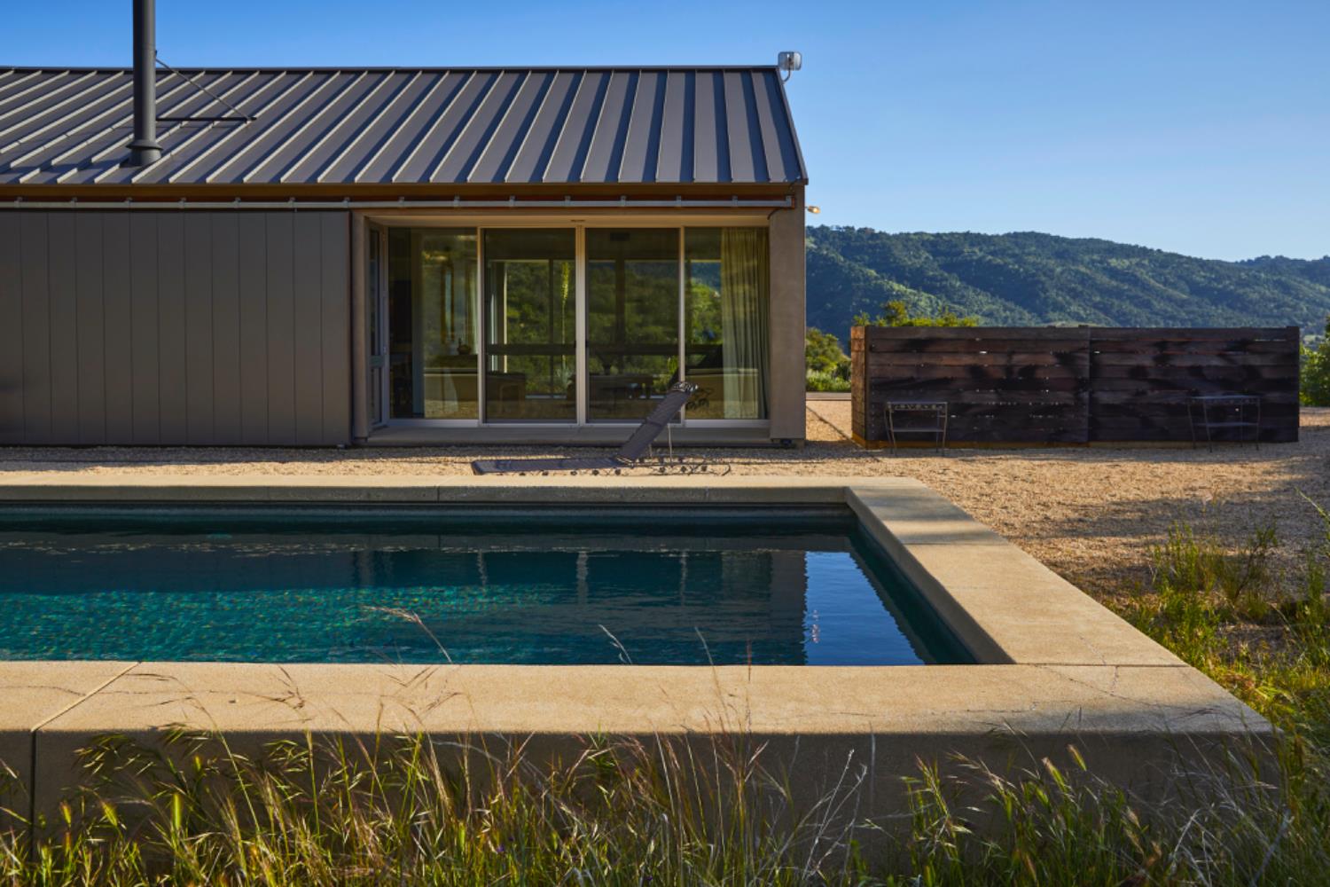 12179 Koenigstein Road Santa Paula, CA 93060 - Photo 2 of 43 a view of a swimming pool with an outdoor space