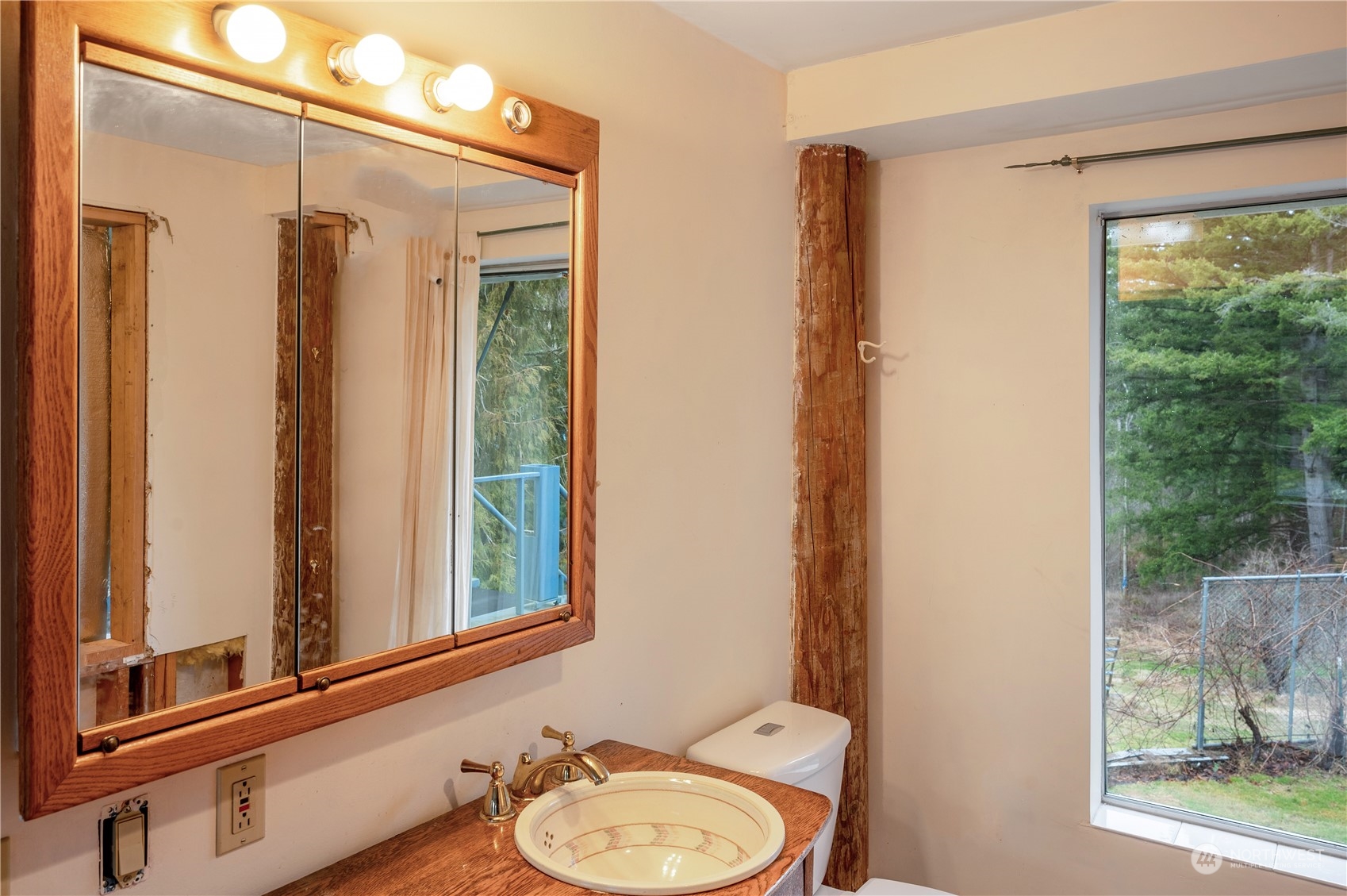 1848 Kelly Road Bellingham, WA 98226 - Photo 13 of 39 a bathroom with a sink a mirror and a shower