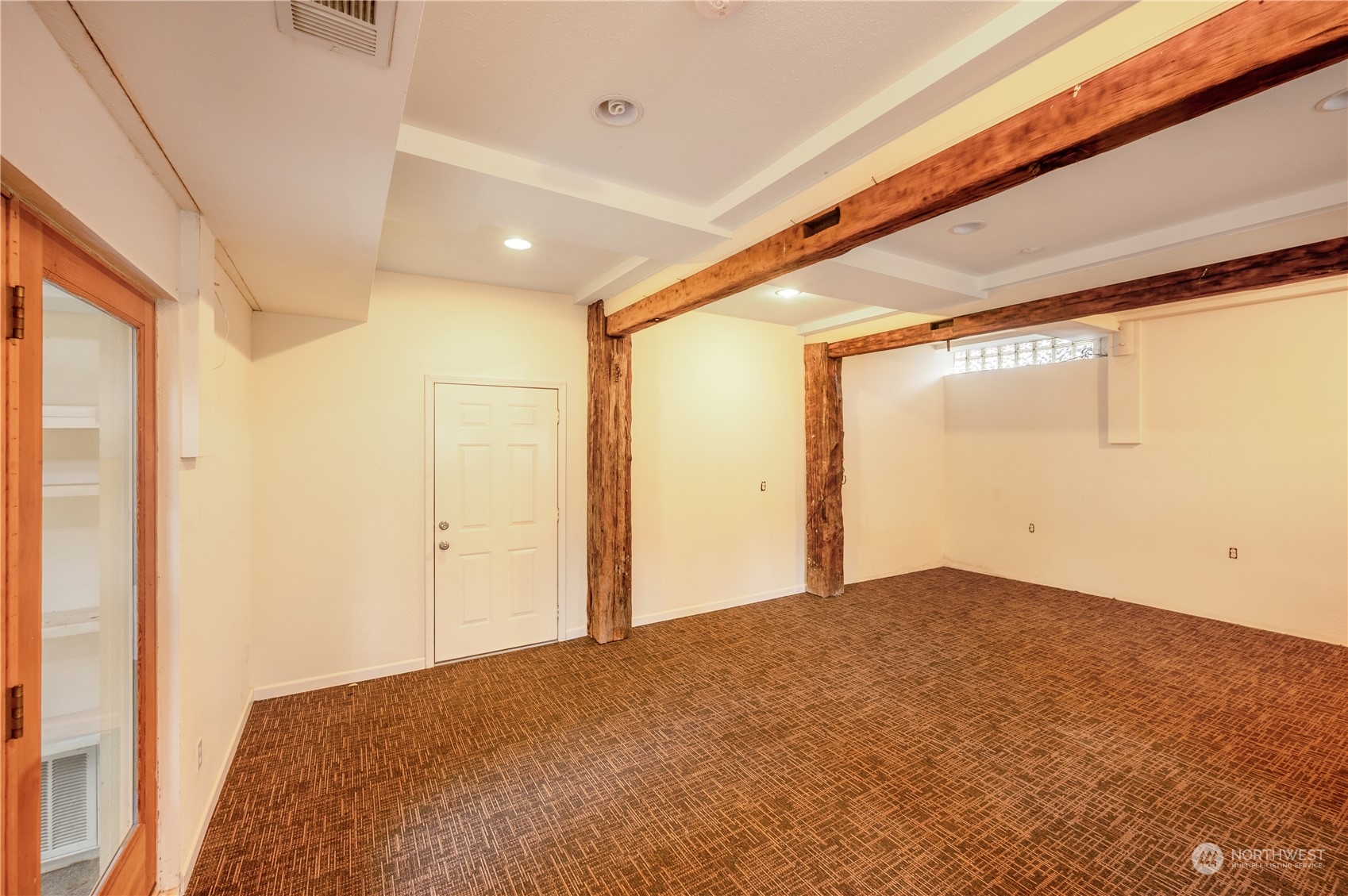 1848 Kelly Road Bellingham, WA 98226 - Photo 20 of 39 a view of a big room with wooden floor and windows