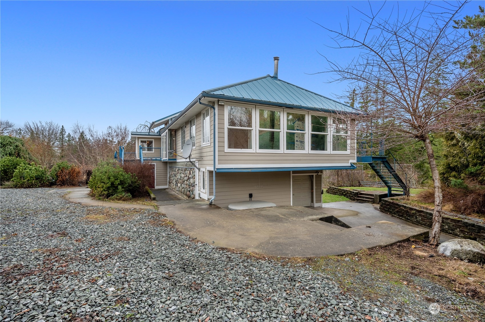 1848 Kelly Road Bellingham, WA 98226 - Photo 23 of 39 a front view of a house with a yard