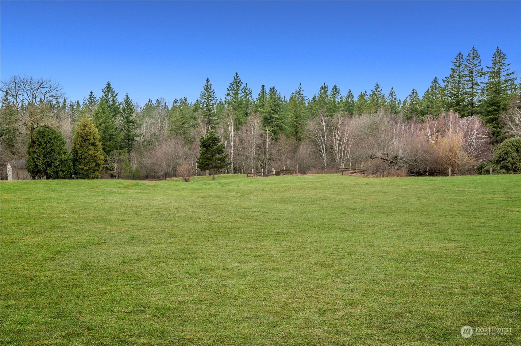 1848 Kelly Road Bellingham, WA 98226 - Photo 31 of 39 a view of a yard with a house in the background