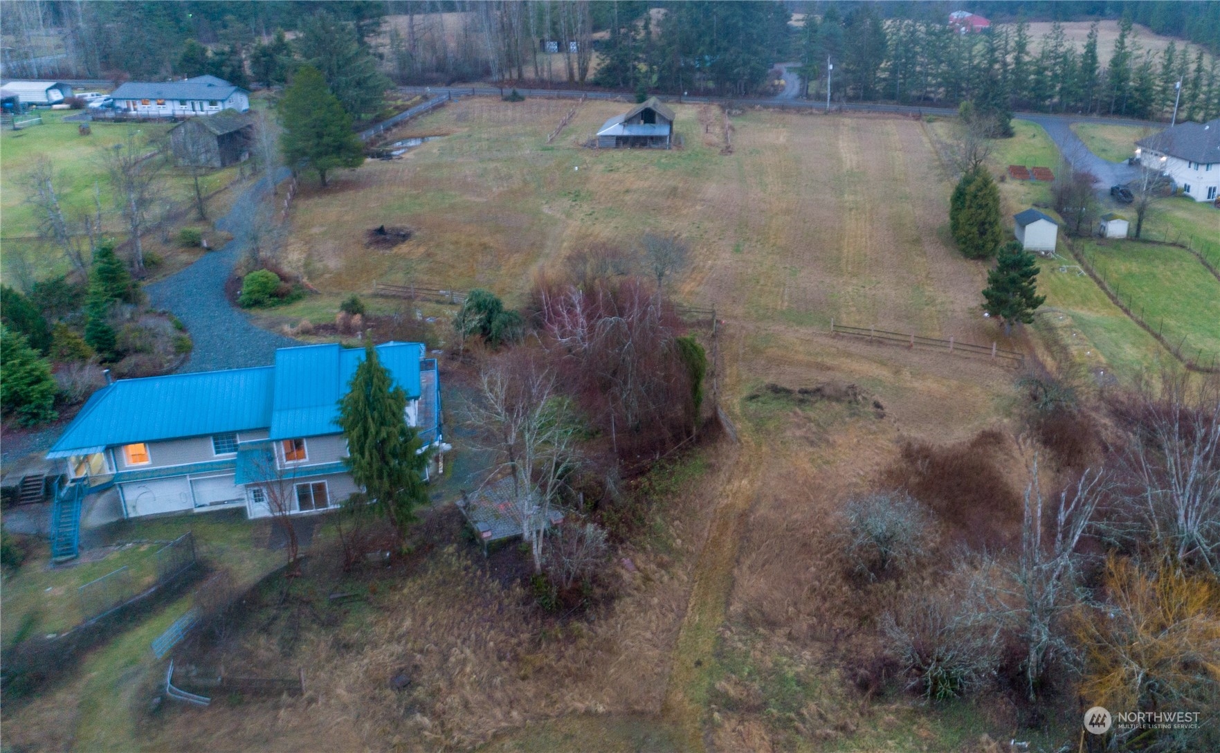 1848 Kelly Road Bellingham, WA 98226 - Photo 4 of 39 a backyard of a house with a yard and outdoor seating