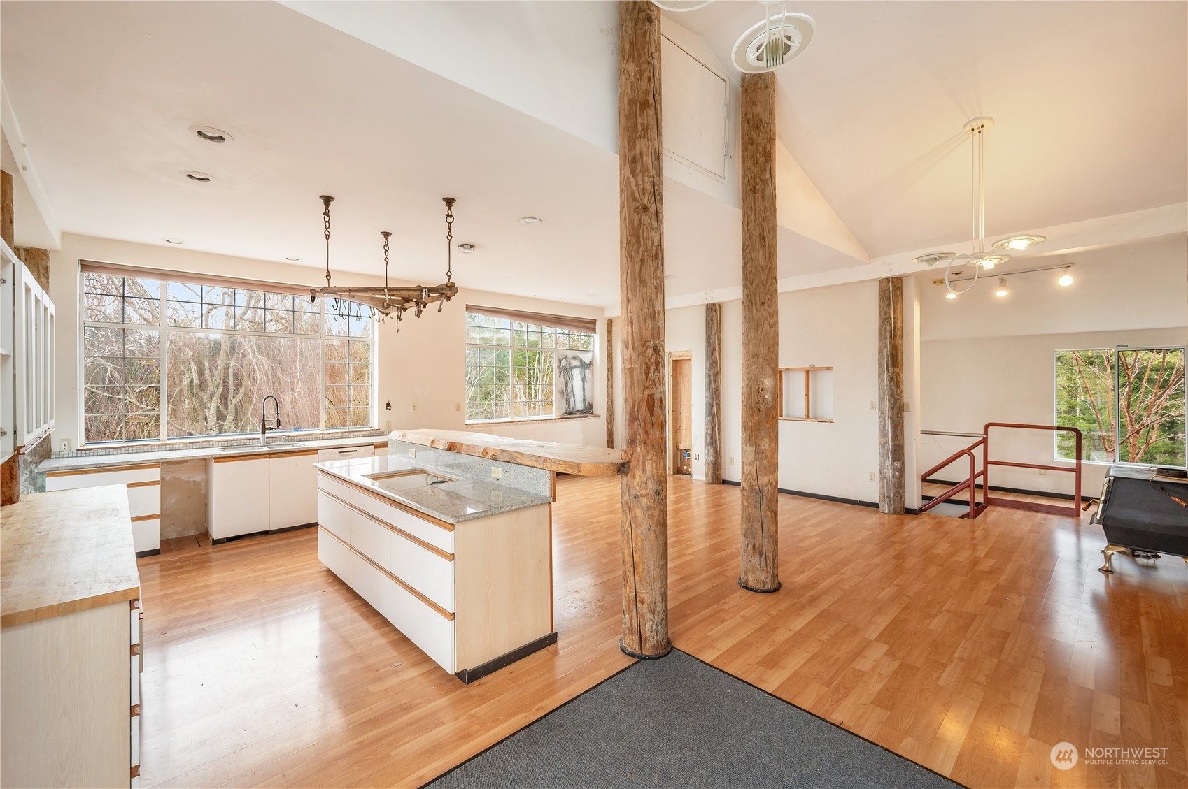 1848 Kelly Road Bellingham, WA 98226 - Photo 7 of 39 a living room with hard wood floors and a kitchen island